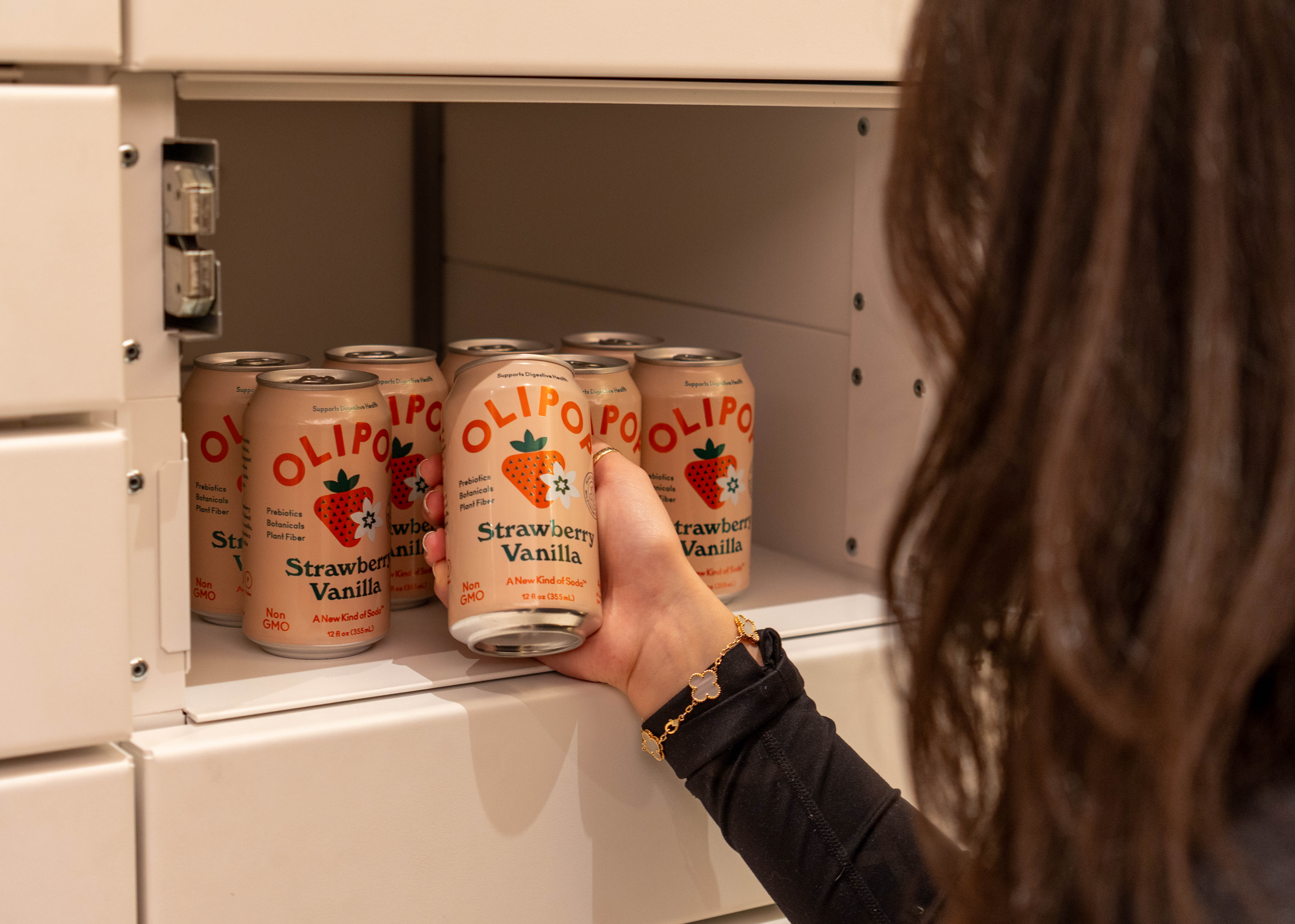 Resident picking up product from Placement locker